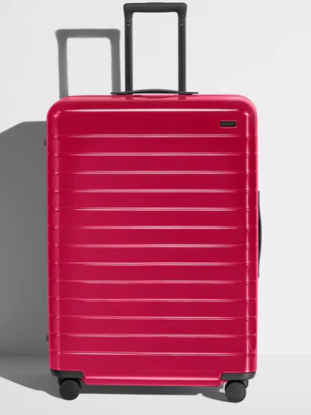 Away Travel: The Large & The Bigger Carry on in Magenta(Gloss) Selling as a set